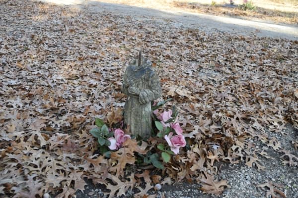 Several headstones have deteriorated and broken over the years. (Emily Davis/Community Impact Newspaper) 