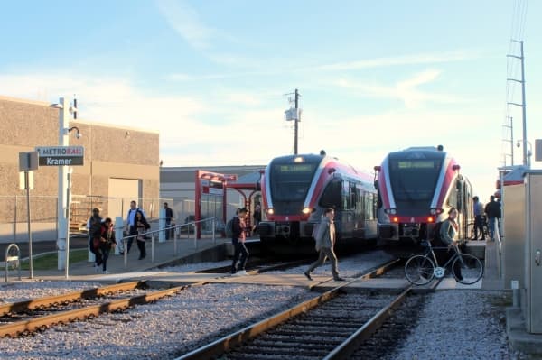 Trains at the Kramer MetroRail Station in North Austin pick up and drop off passengers. (Amy Denney/Community Impact Newspaper