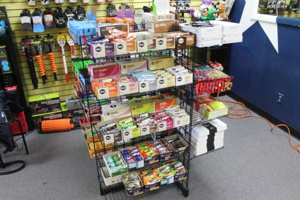 On the Run also sells other things runners use, such as nutrition bars, water bottles and even CBD products. (Jake Magee/Community Impact Newspaper)