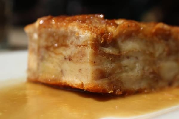 One of the most popular dessert dishes is the homemade bread pudding ($6), which is served with a bourbon butter sauce. (Renee Yan/Community Impact Newspaper)