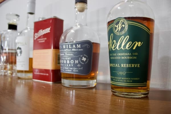 Clients can sip on whiskey, beer or other beverages during a haircut. (Taylor Jackson Buchanan/Community Impact Newspaper)