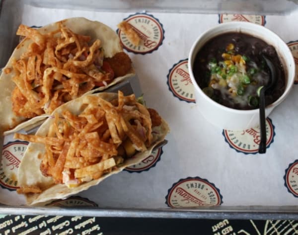 Asian chicken tacos ($9.50): With ginger soy sauce, mango slaw and crispy wantons