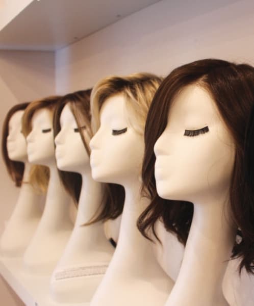 Cure & Co. carries items, such as wigs, needed during cancer treatment. 