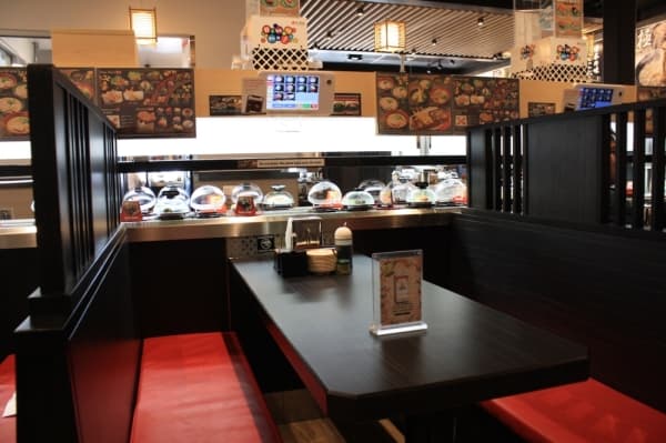 Kura Revolving Sushi Bar has a two-level conveyor belt that delivers sushi dishes. (Jen Para/Community Impact Newspaper)