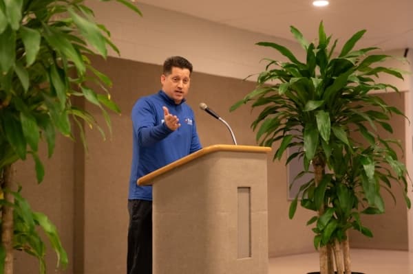 Ron Smith, assistant director of the Plano Parks and Recreation Department, introduced the mayor before drawing the first raffle winner of the night for a free annual membership to Plano Parks and Recreation. (Liesbeth Powers/Community Impact Newspaper)