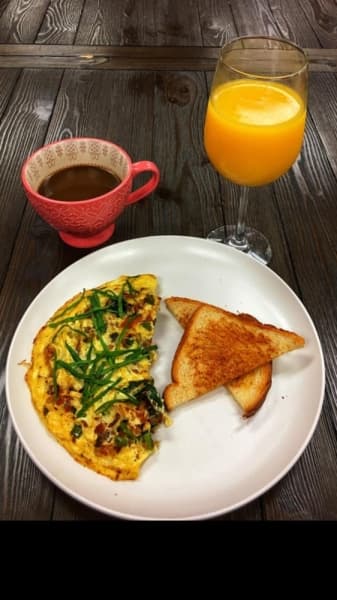 The Montgomery omelet ($7.99) is served with toast and made with three eggs, mushrooms, spinach, roasted bell peppers, sauteed onions and a choice of sausage, bacon or ham. Cheese can also be added to the egg dish. Courtesy World's Burgers