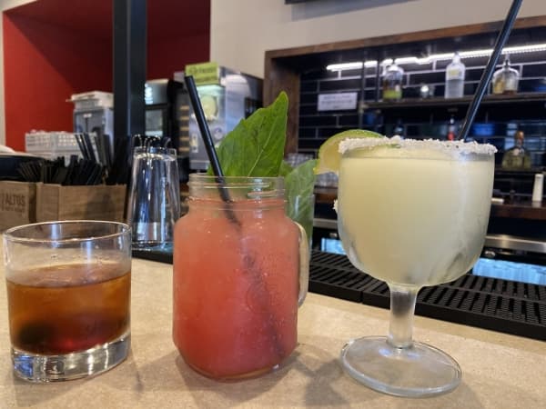 Three popular drinks available at Toss' full bar are, from left, the Old Fashioned, the Watermelon Press and the Frozen Margarita.