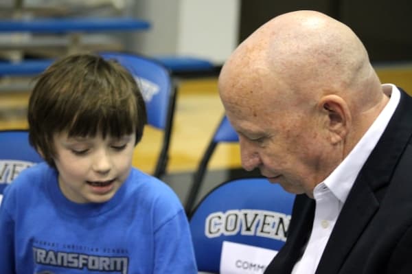Brady speaks with a student from Covenant Christian School. (Andy Li/Community Impact Newspaper)