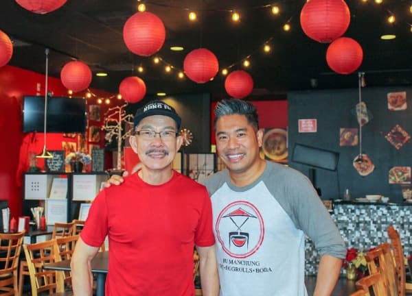 Paul Huynh (right) and father-in-law and head chef Taylor Chung (left) opened Fu Manchung two years ago. (Adriana Rezal/Community Impact Newspaper) 