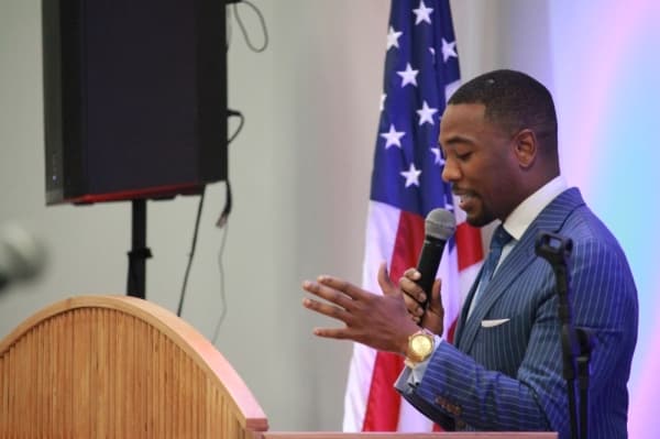 Chauncy Glover spoke on the celebration's theme of building bridges. (Andy Li/Community Impact Newspaper)
