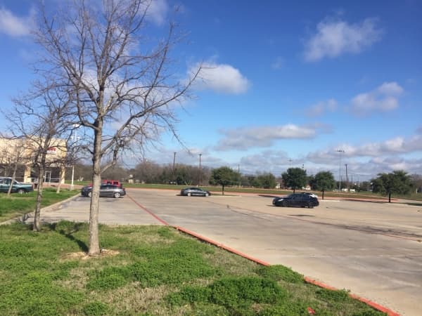 RGC Multifamily has submitted plans for a 224-unit apartment complex on a 2.75-acre site at 150 Mays Crossing Drive, Round Rock. The site is currently a parking lot. (Taylor Jackson Buchanan/Community Impact Newspaper)