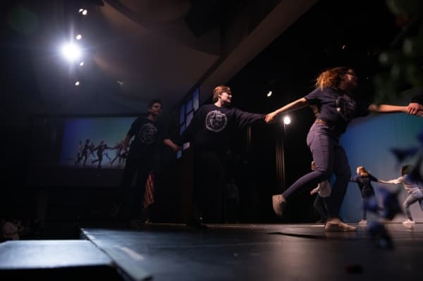 Members of the Clark High School cast of "Matilda" perform a portion of their upcoming production at the Martin Luther King Jr. tribute event. (Liesbeth Powers/Community Impact Newspaper)