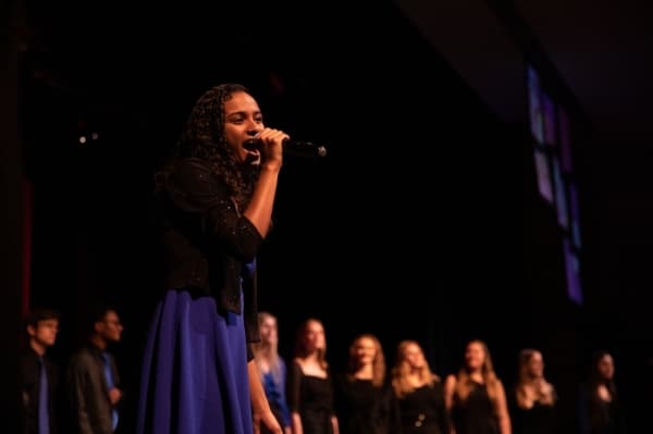Plano West Senior High School Show Choirs perform "Proud" by Heather Smalls for the program finale. (Liesbeth Powers/Community Impact Newspaper)