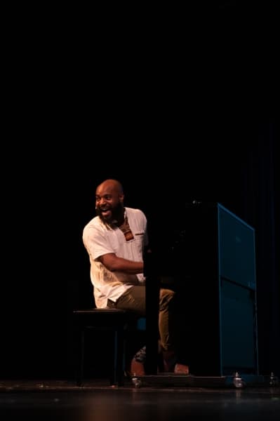 Author and performer Austin Dean Ashford shares a message about taking every opportunity in life using spoken word, singing, piano and the ukulele. (Liesbeth Powers/Community Impact Newspaper)