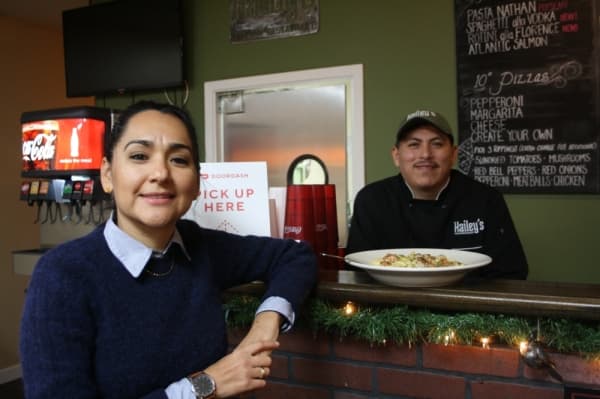 Yasmin Maldonado (left) opened Hailey’s Italian Restaurant in 2018 with her husband Reyes. (Shawn Arrajj/Community Impact Newspaper)