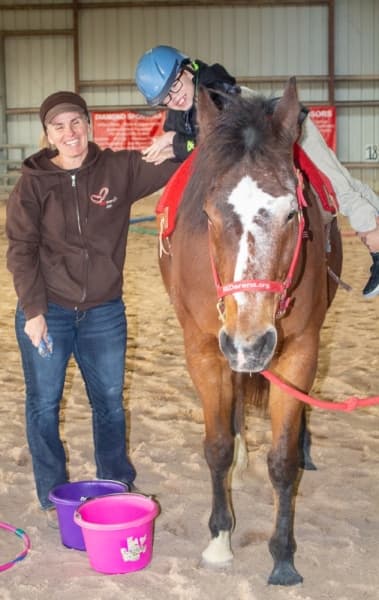 Equine-assisted physical and occupational therapies use the motion of the horse to improve posture, motor skills, mobility, coordination and other treatment goals. (Rachal Russell/Community Impact Newspaper) 