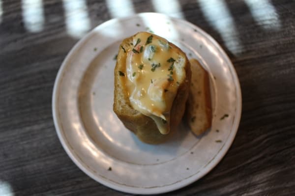 The crawfish pistolet ($3.99) is one of the top-selling appetizers, featuring a deep-fried French roll stuffed with cheese and crawfish tails. (Kara McIntyre/Community Impact Newspaper)