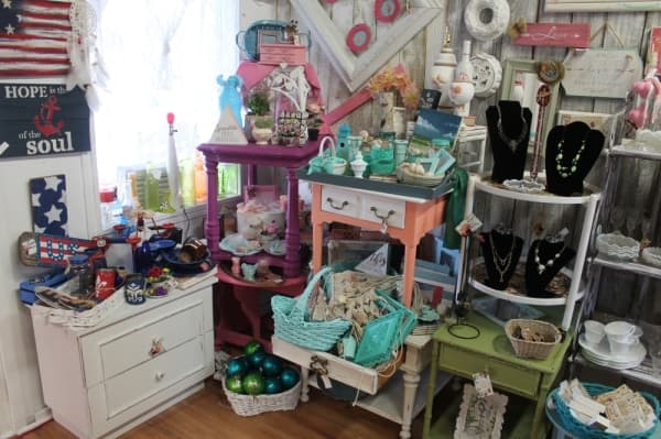 Coastal-themed items are painted turquoise, coral and other sea-related colors. (Jake Magee/Community Impact Newspaper)