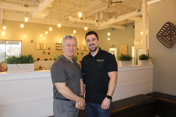 Meff Asani and his son Brian Asani operate Eggsquisite Cafe together. (Miranda Jaimes/Community Impact Newspaper)