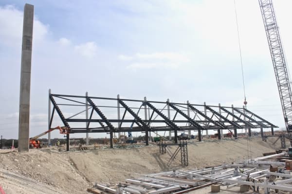 Workers are now erecting the structures for the stands. (Amy Denney/Community Impact Newspaper