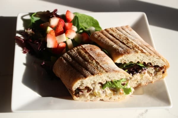 The chicken salad baguette ($10.89) includes pecans and cranberries. (Andrew Christman/Community Impact Newspaper)