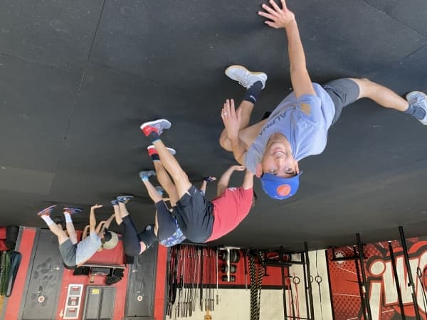 Lakeway Elite Fitness coach John Cecil works with a CrossFit class. 