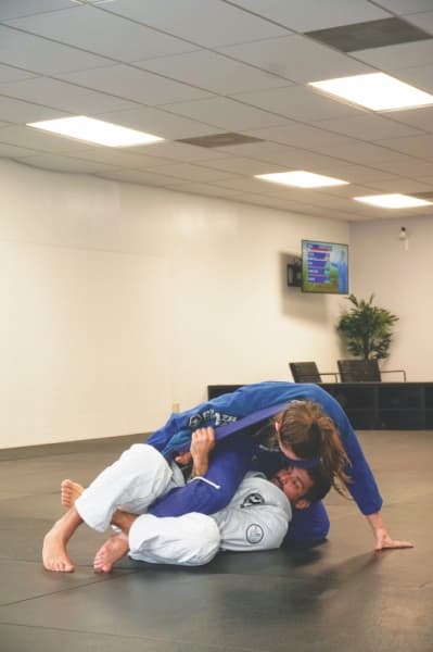 Instructor Hugo Mayer Lima demonstrates a move with a fellow instructor.