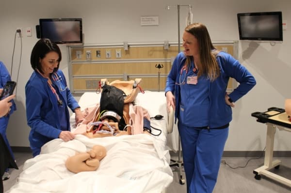 The HCA Healthcare Center for Clinical Advancement simulation rooms feature an interactive pregnancy mannequin that allows nurses to train for childbirth. (William C. Wadsack/Community Impact Newspaper)
