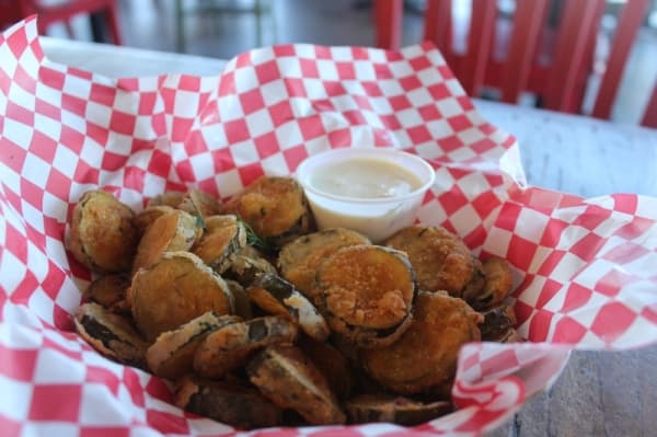 The Pickle House's appetizer menu features fried pickles. (Olivia Aldridge/Community Impact Newspaper)