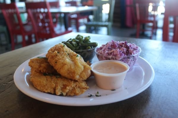 One of The Pickle House's specialty items is pickle-fried chicken. (Olivia Aldridge/Community Impact Newspaper)