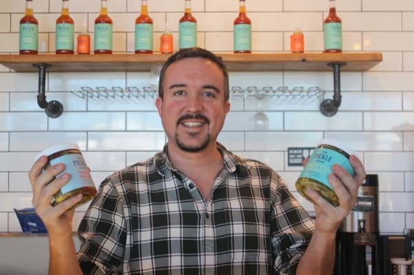 Sam Addison is the owner and founder of The Pickle House. (Olivia Aldridge/Community Impact Newspaper)