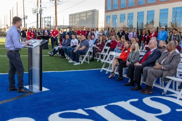 The hospital held a ribbon-cutting ceremony for the clinic at the facility's outdoor athletics field Feb. 7. (Photo courtesy Houston Methodist The Woodlands Hospital)