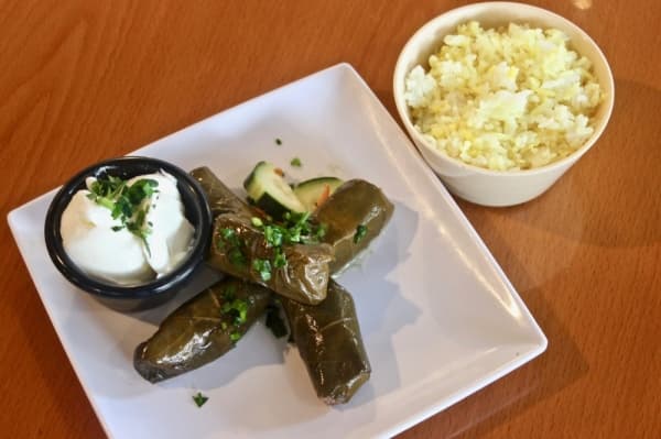 Sides include stuffed grape leaves called dolmas and rice. (Amy Denney/Community Impact Newspaper)