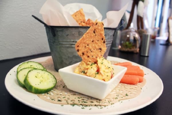 The homemade pimento cheese is made with a blend of Gouda, cream cheese, Colby Jack and spices. ($7) (Andy Li/Community Impact Newspaper)