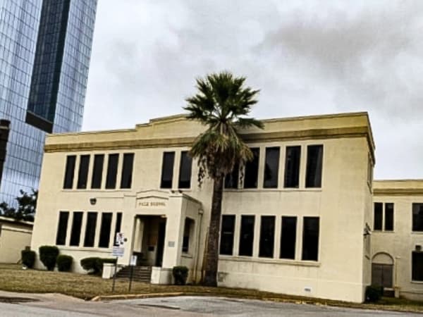 Travis County judge unimpressed with Austin’s initial bid to buy historic Palm School