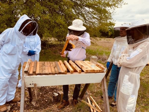 Les Crowder shows students the use of a top bar hive. The Central Texas Beginning Beekeepers School returns March 21. (Courtesy Central Texas Beekeepers Association)