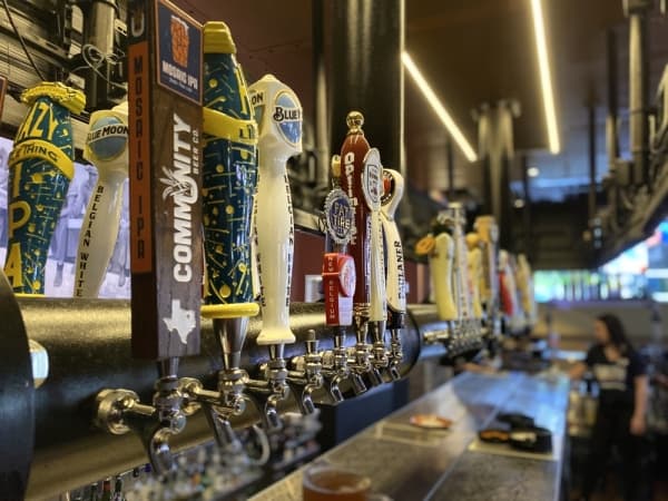 Lambeau's America Kitchen and Taps serves a variety of beers. (Photo by Anna Herod/Community Impact Newspaper)
