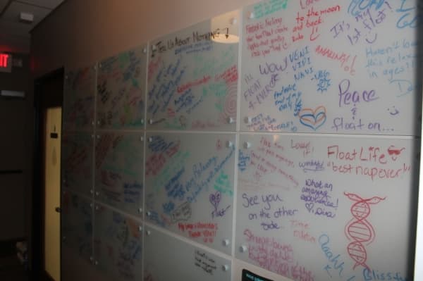 The center features a wall where customers can write about their experiences.