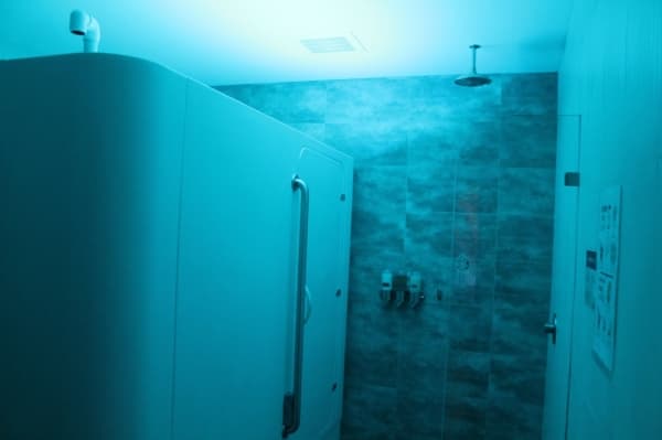 The flotation therapy rooms feature a shower and an enclosed tank filled with 10 inches of water and hundreds of pounds of dissolved salt. (Jake Magee/Community Impact Newspaper)