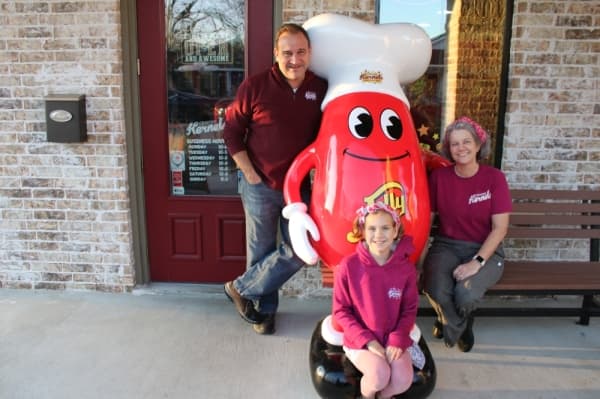 Owners Randy and Tracey Harmon and daughter, Brynna, opened the shop in 2018. (Carrie Taylor/Community Impact Newspaper)