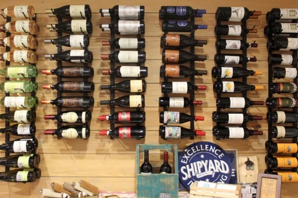 The shop includes a variety of artisan goods and groceries, including a small selection of wine and beer.
