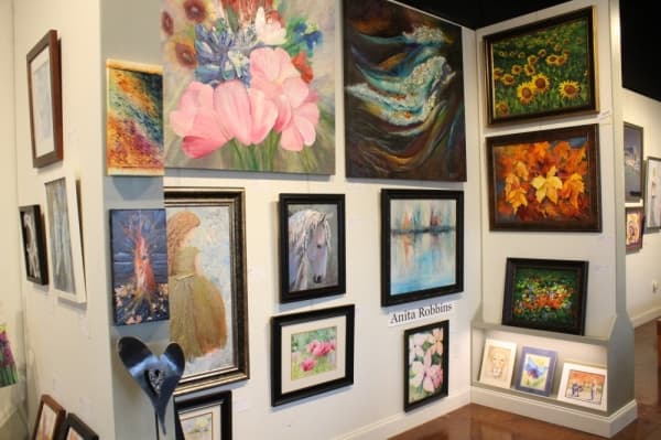 Co-owner Anita Robbins has sold her art all over the world. (Anna Herod/Community Impact Newspaper)