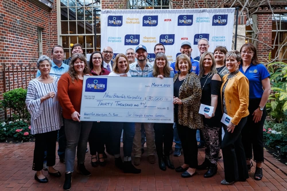 Wurstfest nonprofits presented with check from fundraiser
