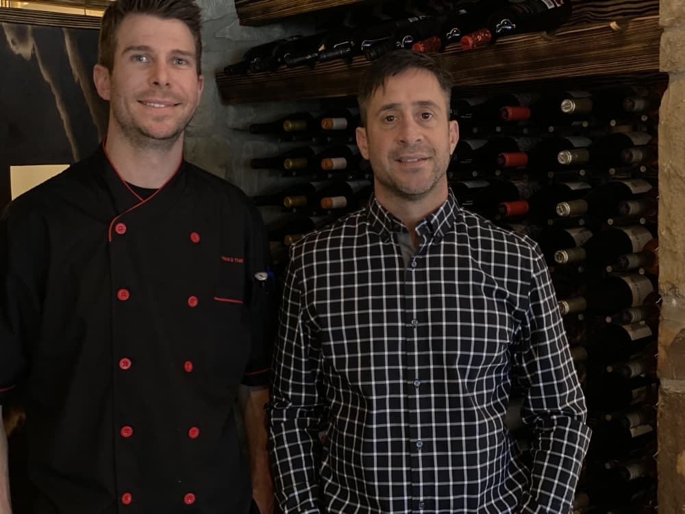 Executive Chef Devin Glenn (left) runs the kitchen at Frog & The Bull for owner David Fernandez.