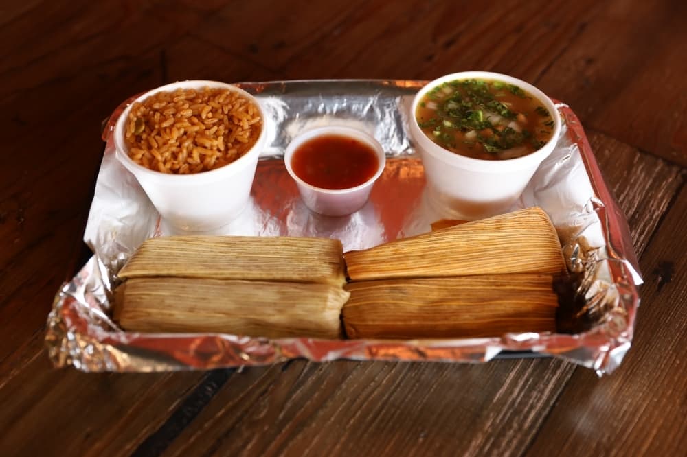 The Tamale Plate ($6 for two, $8 for four) is served with rice and beans. Tamale options include pork, beef, chicken, habanero pork, hatch pork and black bean. (Photos by Liesbeth Powers/Community Impact Newspaper)