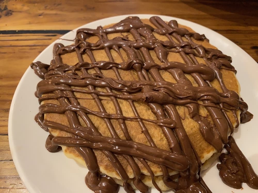 Omelets are served with a side of pancakes. Owner Benny Polisi said his daughter Donika’s favorites are the ones made with Nutella. (Renee Yan/Community Impact Newspaper)