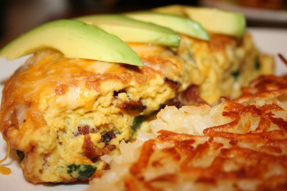 The bacado omelet ($9.59) is the best-selling item at Benny’s Cafe, Polisi said. It contains bacon, spinach, tomato, Monterey Jack cheese and sliced avocado. (Renee Yan/Community Impact Newspaper)