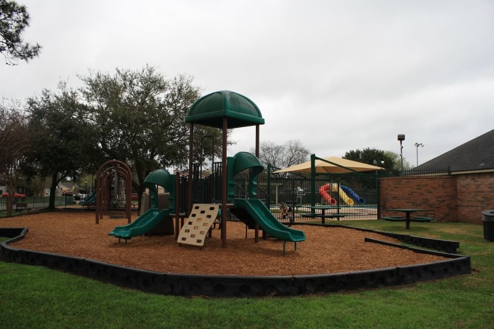 The neighborhood’s playground and pool areas are adjacent to each other. (Jen Para/Community Impact Newspaper)