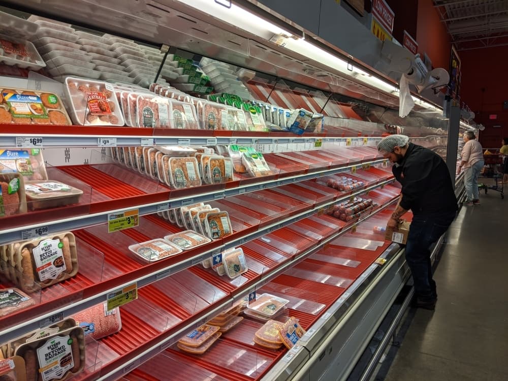 Some aisles at H-E-B locations in New Braunfels were empty on Friday, March 13. (Lauren Canterberry/Community Impact Newspaper)