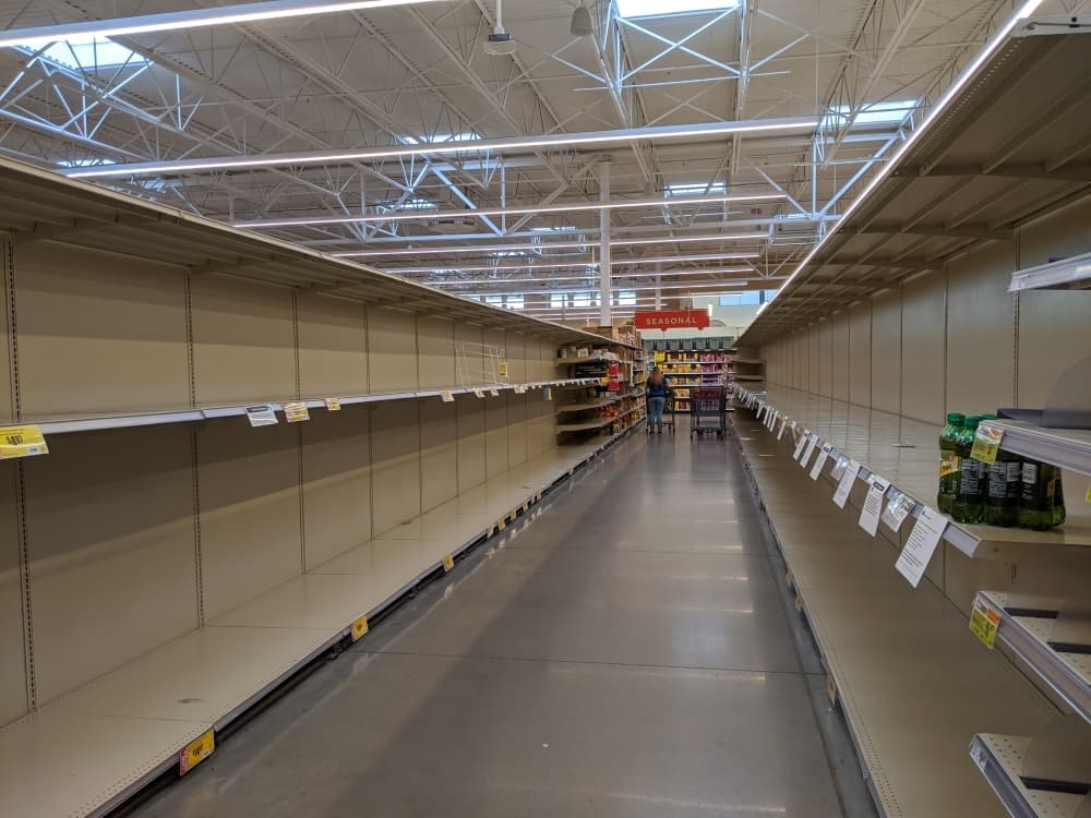 Some aisles at H-E-B locations in New Braunfels were empty on Friday, March 13. (Lauren Canterberry/Community Impact Newspaper)